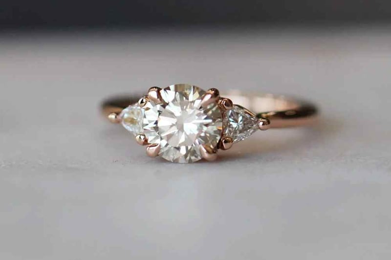 Side stones engagement ring