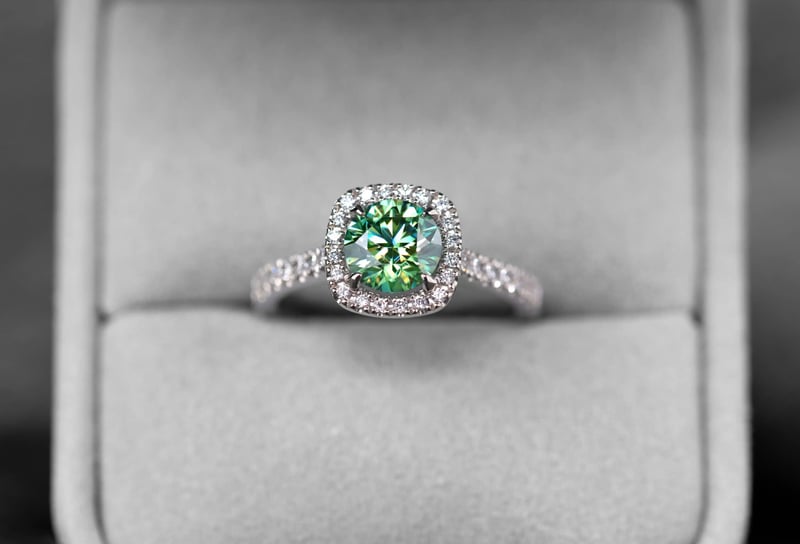 What does a green engagement ring mean