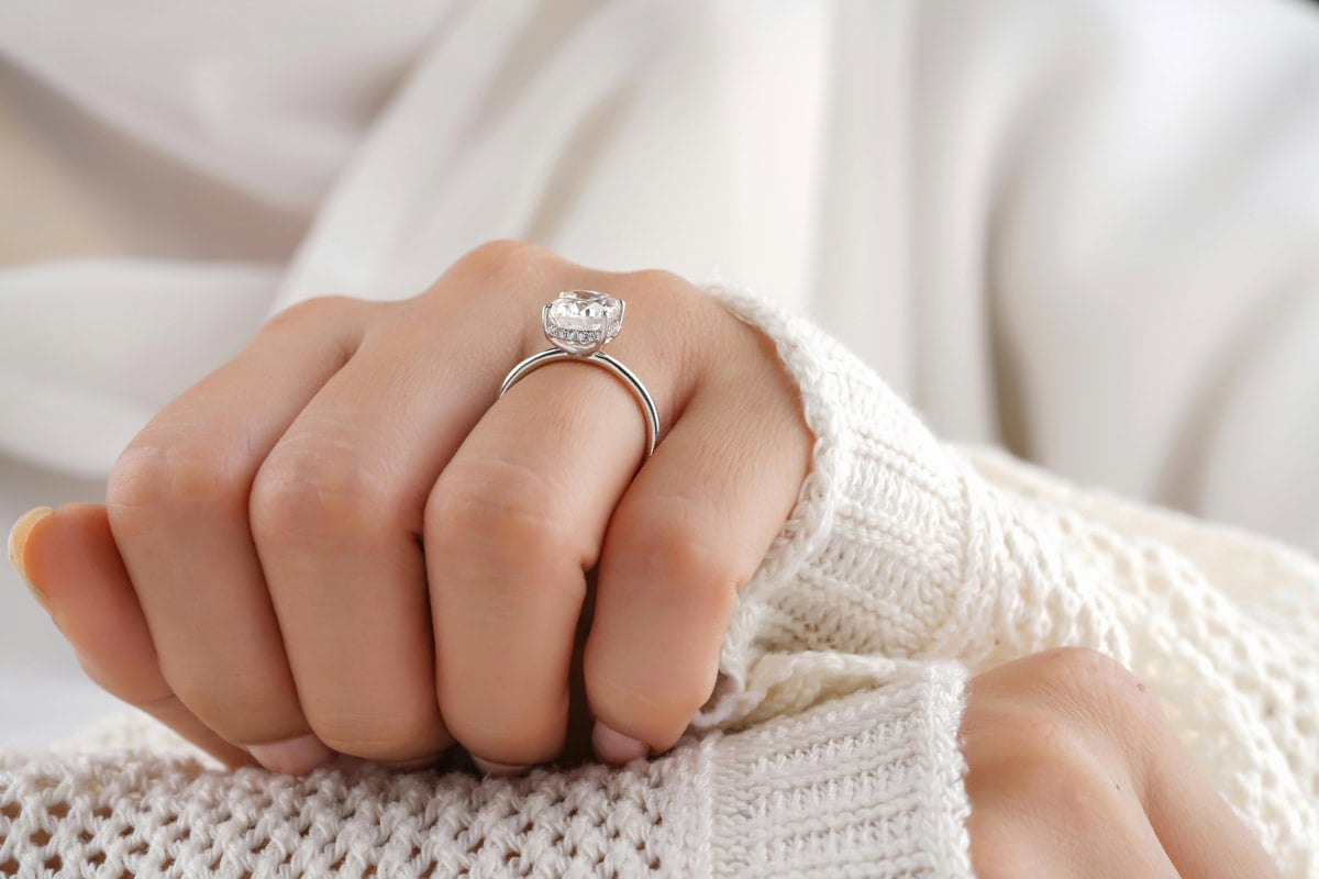 women wearing an engagement ring